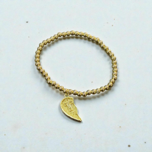 Pulsera medio corazon cruz
